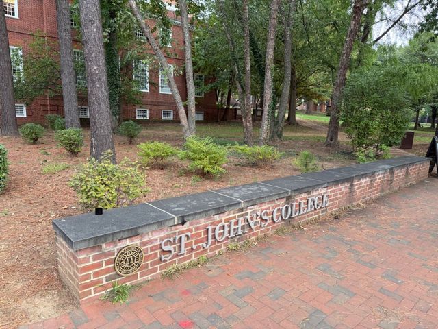 The brick St. John's College wall along College Avenue