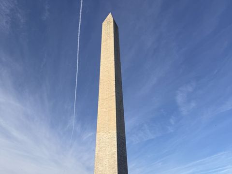The World War II Memorial fountains, with the Lincoln Memorial at the far end of the Reflecting Pool